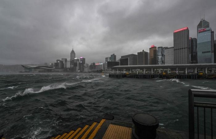 Hong Kong battered by strong winds and heavy rain as Typhoon Wipha skims past