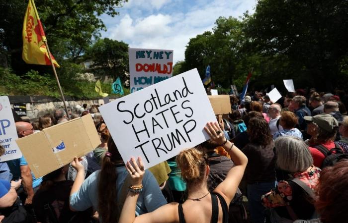 Trump plays golf under tight security in Scotland as protests erupt over visit