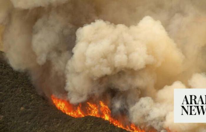 Massive wildfire in central California threatens homes, injures 3 people as it burns out of control