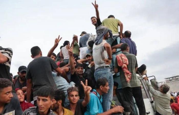 At least 20 Palestinians killed after aid trucks overturn in central Gaza