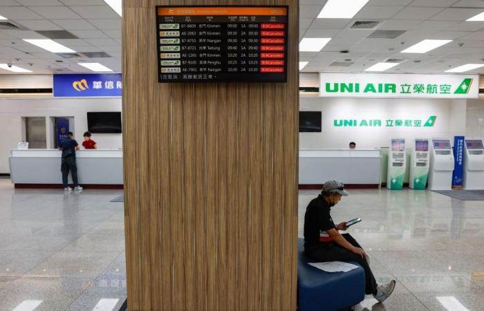 Southern Taiwan shuts down with evacuations and flight cancellations as Typhoon Podul approaches