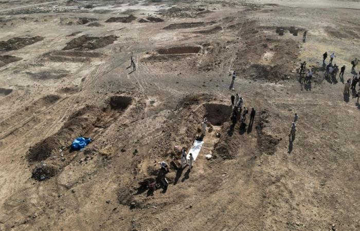 Iraq begins excavation of mass grave near Mosul believed to hold thousands of IS victims