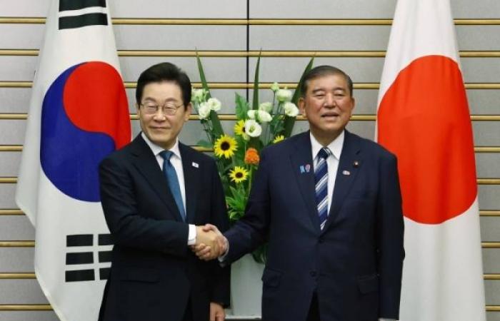 South Korea, Japan vow to move past disputes as leaders hold first summit in 17 years