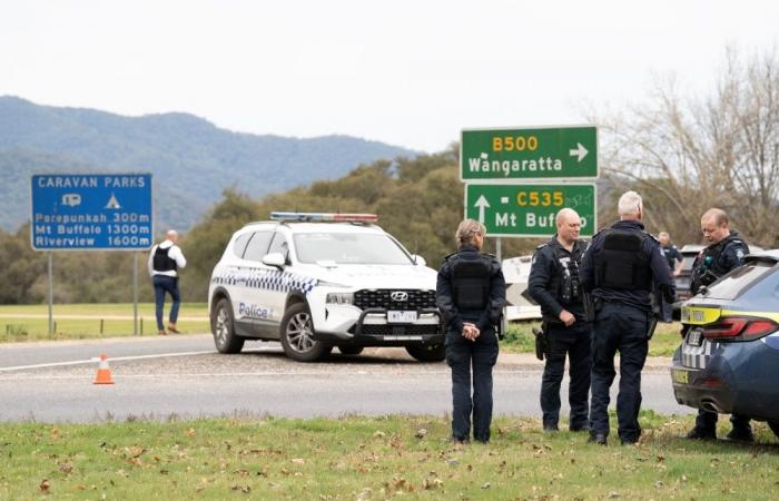 Gunman on the run after killing two police officers in rural Australia