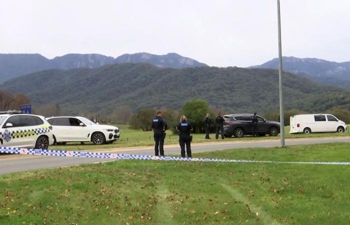 Armed manhunt in Australia after gunman kills two police officers