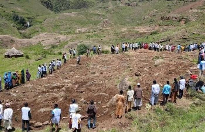 Sudanese villagers dig by hand to recover landslide victims, aid group says