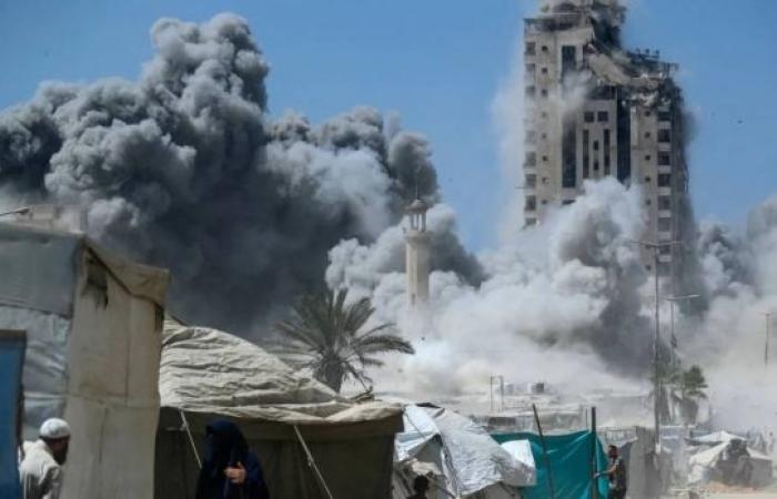 Israel orders Gaza City evacuation, bombs high-rise towers