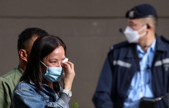 Grief and grim photos: Hong Kong families search for loved ones after deadly blaze