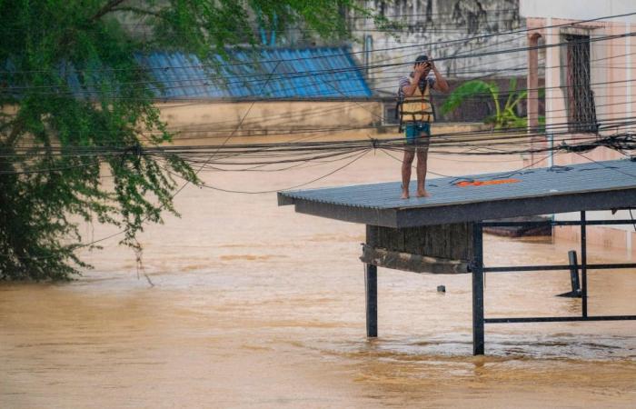 Clean-up begins in Thailand and Indonesia after catastrophic floods claim hundreds of lives