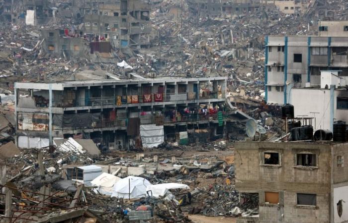 In Gaza’s cash crunch, woman turns banknote repair into a lifeline