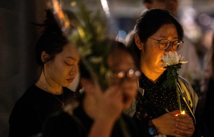 Hong Kong student union suspended after note demanding justice for fire victims