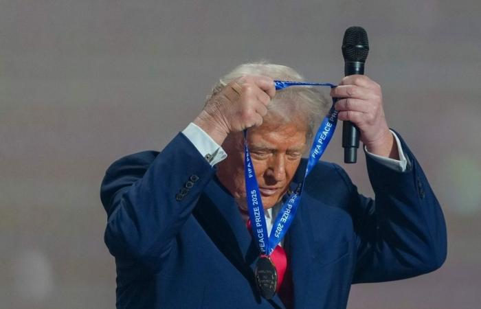 Peace medal and YMCA: Trump steals the show at World Cup draw