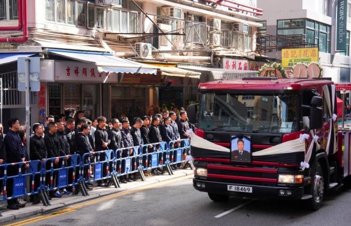 Hong Kong fire death toll rises to 161, police say