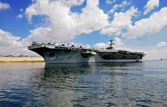 Trump says Iran is negotiating with US as tensions escalate and warships move into region