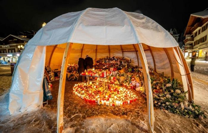 After deadly Swiss bar fire, memorial for victims goes up in flames