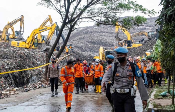 Indonesian rescuers end search after seven killed in massive landfill landslide