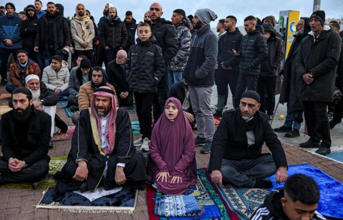 Worshippers blocked from Al-Aqsa mosque hold Eid prayers outside gates in Jerusalem