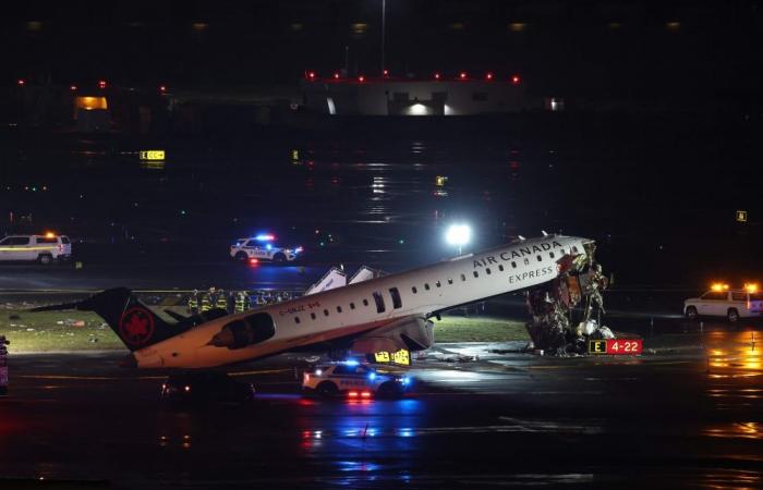 Plane hits fire truck at New York’s LaGuardia airport