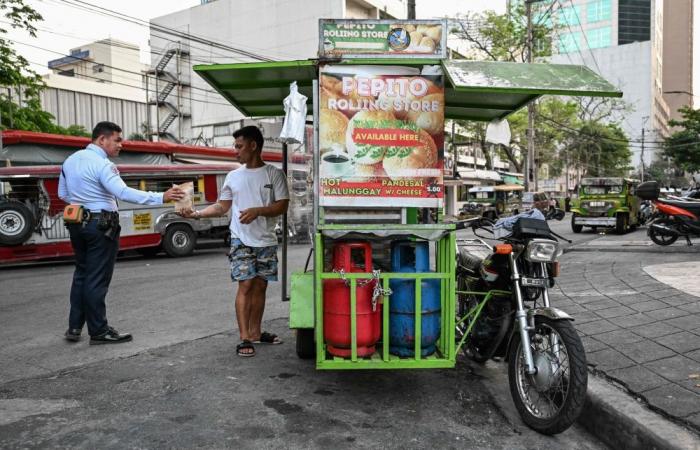 Filipinos feel pinch as LPG prices soar, hitting street food vendors after Middle East conflict