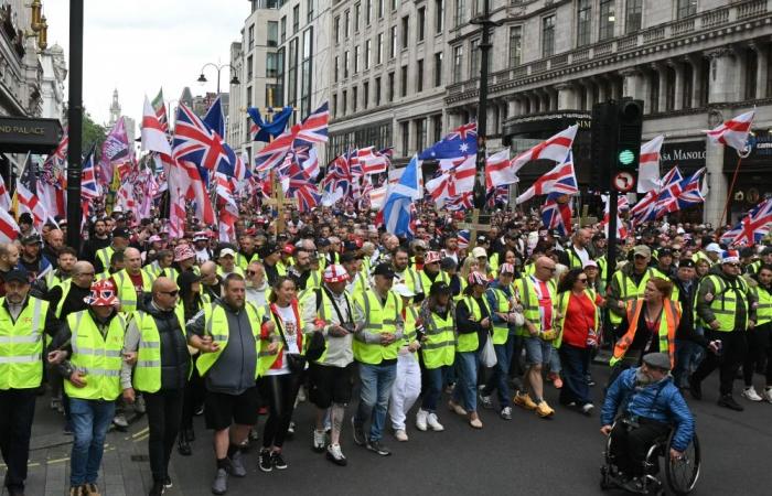 ‘Make England Great Again’: Tommy Robinson rally draws tens of thousands amid rival London protests
