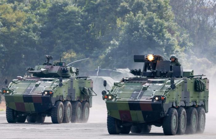 Hundreds rally in Taipei for defence spending after parliament cuts funds