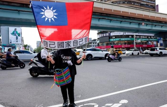 Taiwan says Chinese coast guard ship leaves Pratas waters after tense standoff