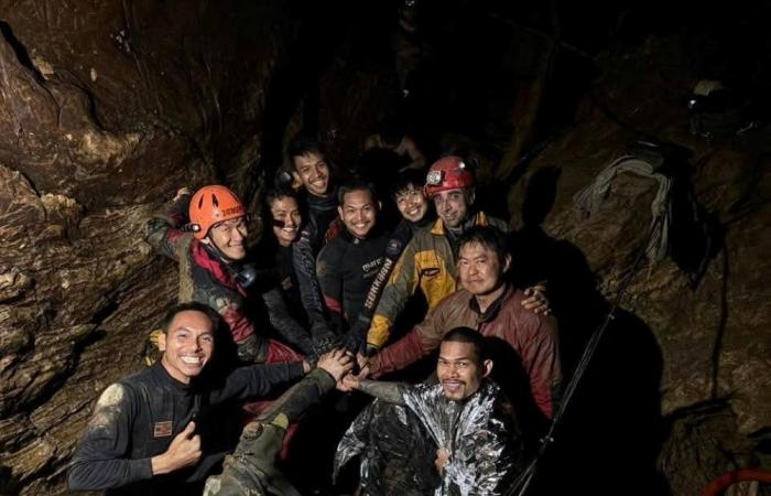 One of seven men rescued from Laos cave after week trapped underground