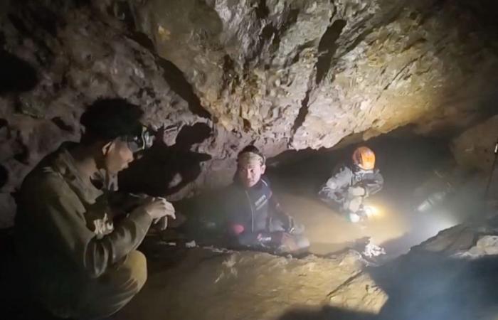Survivors advise rescuers as risky search begins for last two trapped in Laos cave
