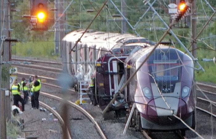 ‘Huge bang’ as two trains crash north of London, killing one passenger