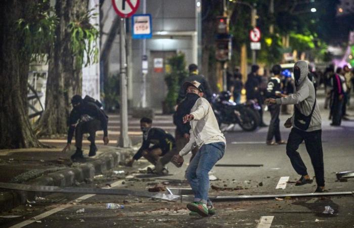 Indonesia charges four after fuel price protests turn violent