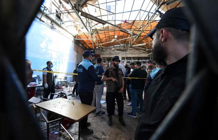 Ambulances race through Damascus after cafe bomb blast near courthouse kills nine, wounds 20 amid chaos