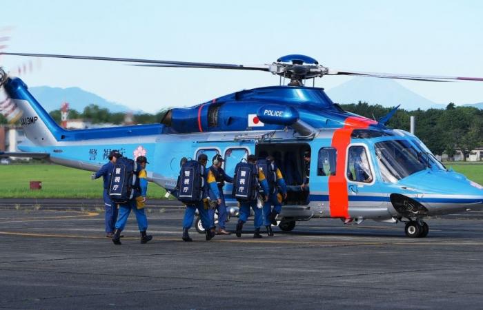 Japan quake kills 13 as rescuers race to find survivors trapped in rubble