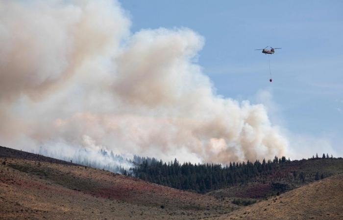 Fast-moving wildfire threatens Reno as tens of thousands ordered to flee