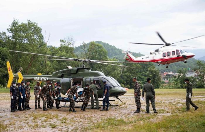 Tibet rescue hampered by fresh flood risks, heavy rain and buried roads under mud 1.5 metres thick