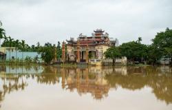 Bridge swept away, children stranded on rooftops as Vietnam’s flood toll hits 41