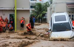 Clean-up begins in Thailand and Indonesia after catastrophic floods claim hundreds of lives