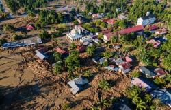 Indonesians pick up the pieces after floods ravage island