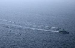 US warship surge puts Iran strike option on table