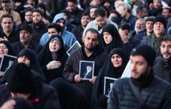 Iran divided: As some mourners weep in Tehran, others topple statues and dance in streets