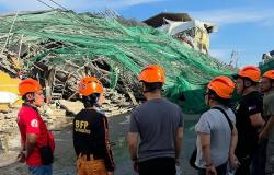 Two trapped people alive after Philippines building collapse, rescue continues