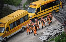 China rescuers search for two men still missing after mine blast kills 82