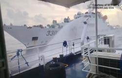 China fires water cannon at Philippine coast guard vessels near Scarborough Shoal