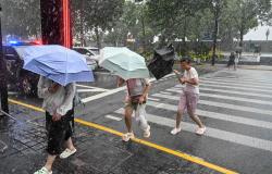 Typhoon Dolphin weakens but leaves hundreds of flights cancelled and flood alerts across China