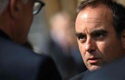 Residents jeer French PM on visit to fire-hit region