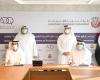 A cooperation agreement between “Abu Dhabi Economy” and “Holding” – the...