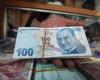 The Turkish lira is falling to a record level against the...