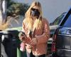 Sofia Richie rocks a plaid shirt while meeting a friend at...