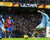 Late penalty rocks Man City as Palace hold champions