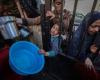Attack kills 20 and injures 155 at Gaza food aid point, as Israel denies responsibility