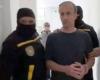 Venezuela's ex-oil minister El Aissami reappears — in handcuffs